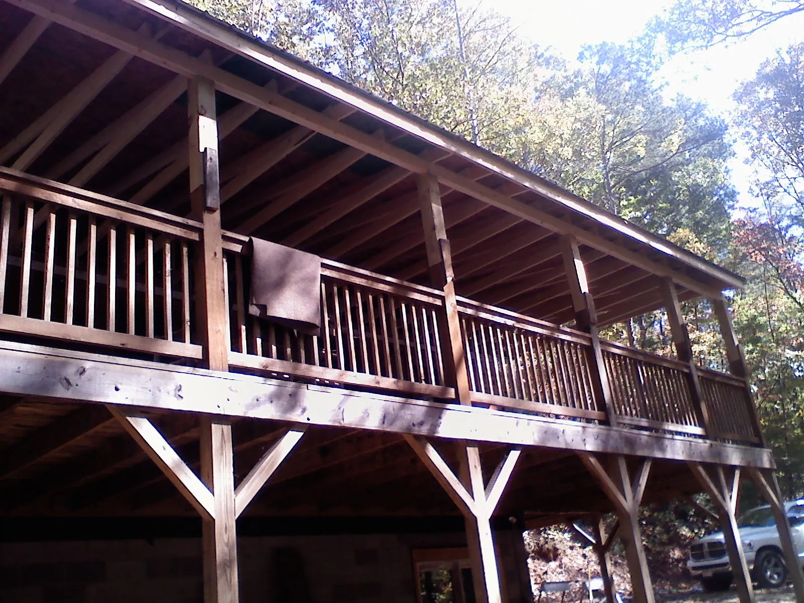 Timber framing under a new elevated porch and deck — Roof Leak Repair in North Hills by Roofing Brothers